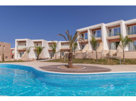 Discover a beautifully designed Mediterranean home set…