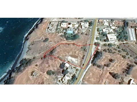 Land 200m away of the coast line in Pomos facing a… - Houses