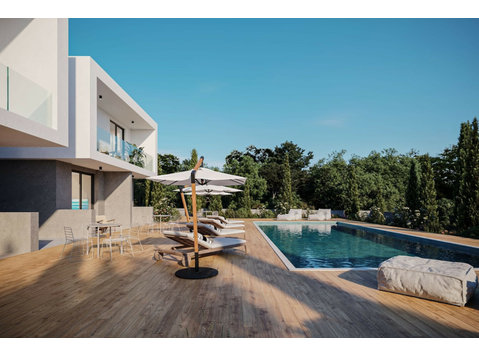 Nestled in the heart of Chloraka, this exclusive gated… - בתים