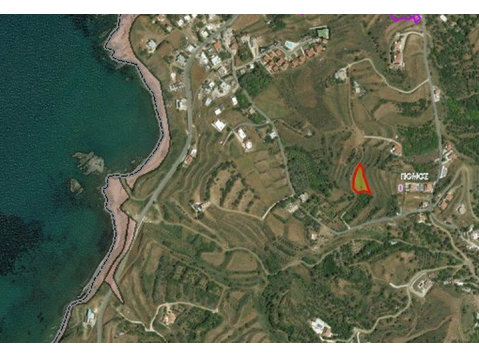 Residential land in Pomos,Paphos district of 1227sqm with… - Houses