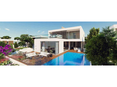 Step into a new realm of coastal luxury with this… - Houses
