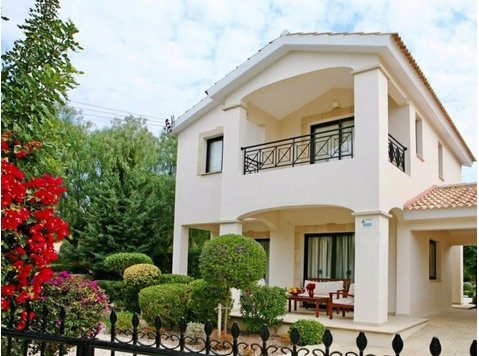 Surrounded by well-tended gardens, this elegant villa,… - Talot