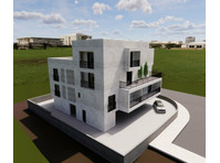 This is a development of apartments that combines modern… - منازل