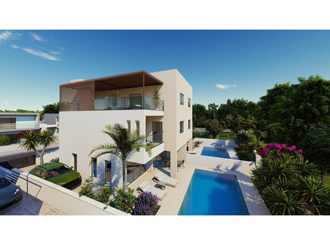 This is a spacious and modern  4 bedroom villa in the heart… - Huse