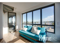 Trendy residence with a river view - Apartemen