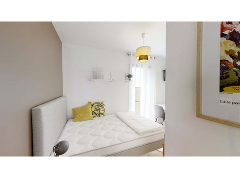Chambre 1 - MATHALY L - Appartements