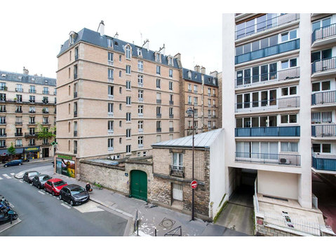 Chambre dans le 25 rue Oscar Roty - Appartements
