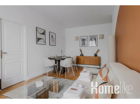 Parijse charme: Elegant appartement met 1 slaapkamer - Appartementen
