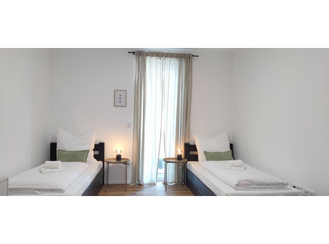Apartment with garden and parking space / Netflix / 10 min.… - Te Huur