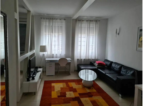 Beautiful fully furnished 2-bedroom flat with upscale… - Aluguel