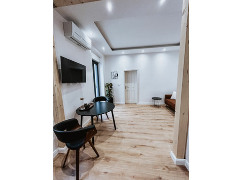 Fully renovated 2 room apartment in the city center… - Te Huur