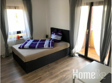 Cozy 1-room apartment with balcony - Διαμερίσματα