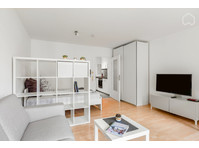 Bright, modern furnished apartment in… - Cho thuê