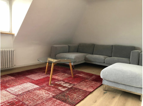Nice 2.5-room attic apartment with garden in… - Til Leie
