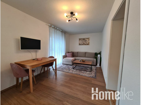 Fully furnished, serviced apartment next to Patch Barracks - Апартаменти