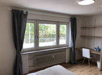 Zimmer in der Wangener Straße - Appartements