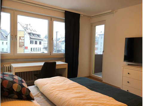 Zimmer in der Wangener Straße - Apartments