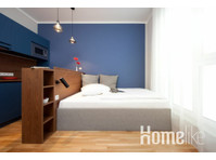 Cosy Apartments - Modernes 1 Zimmer Apartment mit Küche - Wohnungen