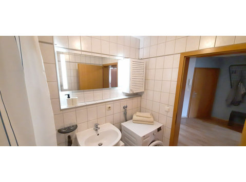 Quiet, furnished 2-room apartment with balcony and WiFi in… - Izīrē
