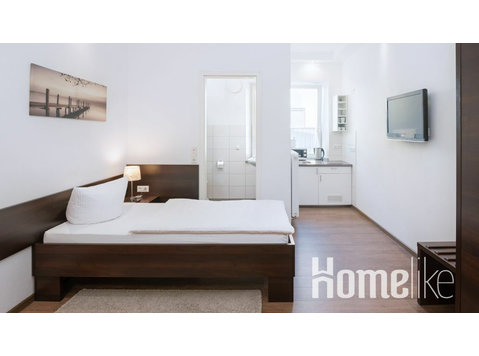 Cozy single bed studio - Apartments