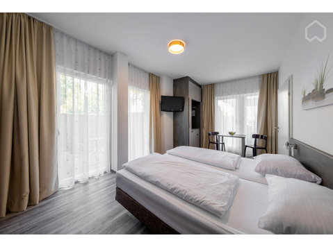 Charming serviced flat in perfect location at Schloßpark… - برای اجاره