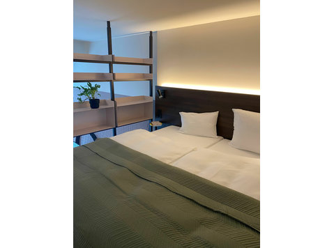 Gorgeous and modern DUPLEX Serviced Apartment in Munich… - 	
Uthyres