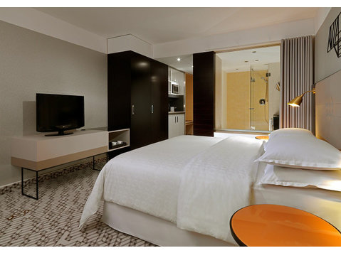 Longstay Studios mit Ausblick, Spa, Fitness, Reinigung… - Zu Vermieten