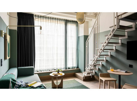 Modern apartment mezzanine (with 2 beds or a couch)… - Annan üürile