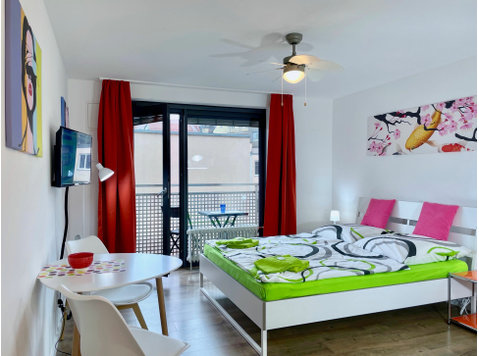 Quiet, modern Hotel room with balcony in the city center - For Rent