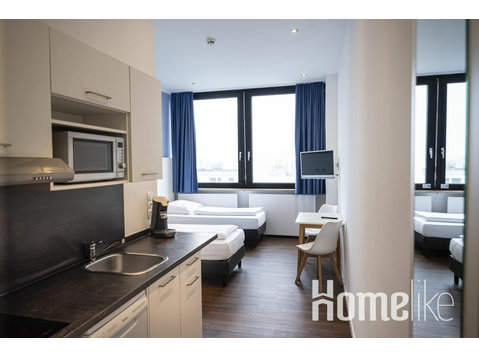 Habitación moderna con dos camas en Munich - Pisos