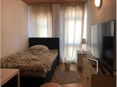 Zimmer in der Deisenhofener Straße - Apartamente