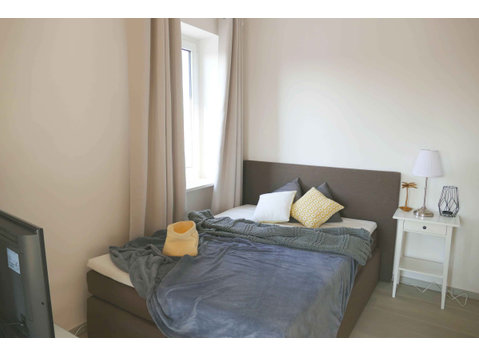 Zimmer in der Grünwalderstraße - Apartments