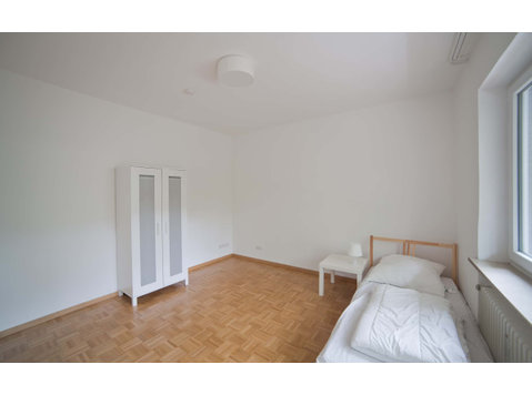 Zimmer in der Romanstraße - Apartments