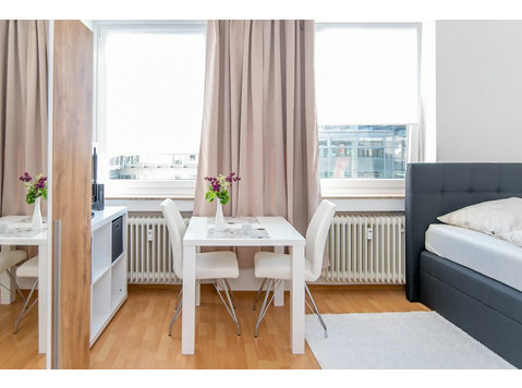 Bright modern apartment in the middle of the city center in… - Til Leie