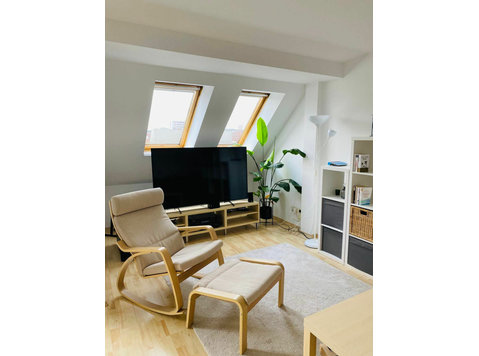 Fantastic 2-room attic apartment with terrace - Disewakan