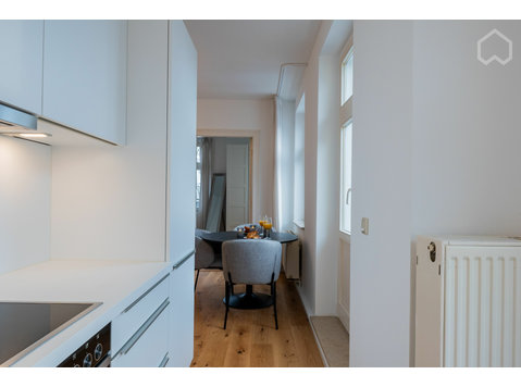 Moderne und stilvolle 2-Zimmer-Wohnung in einer grünen und… - Zu Vermieten