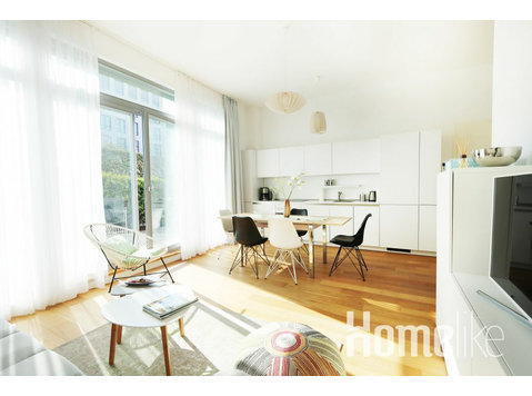 Zonnig begane grond appartement met groot terras in Mitte - Appartementen