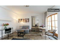 Ground flour studio with terrace for rent in Weissens