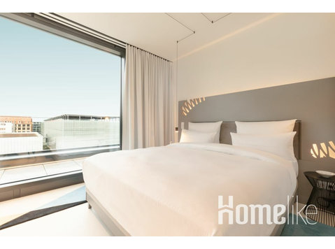 Aparte woon- en slaapgedeeltes in onze deluxe suite van 50… - Appartementen