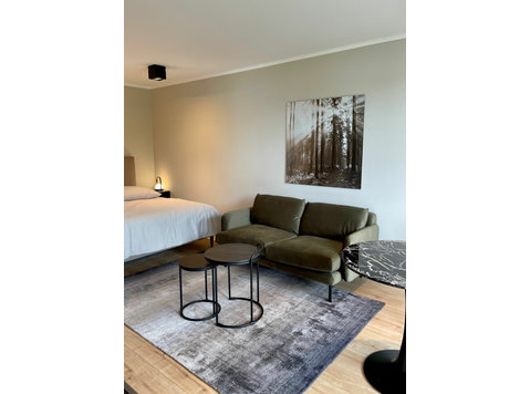 Modernes, vollständig möbliertes Apartment im 2. OG mit… - Zu Vermieten