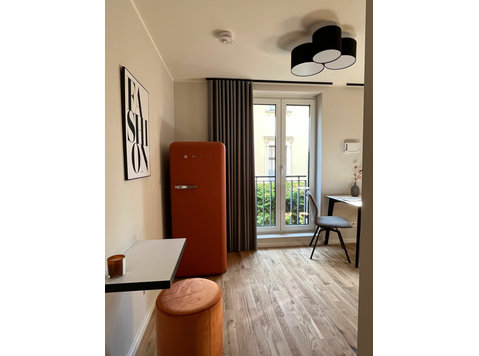 Stilvolles 1-Zimmer-Apartment mit Designküche und… - Zu Vermieten
