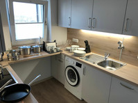 Cozy & bright 2-room apartment in a preferred location in… - Aluguel