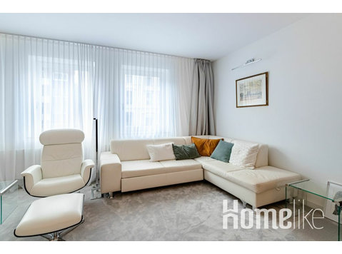 Luxurious and modern furnished apartment in the heart of… - Apartamentos