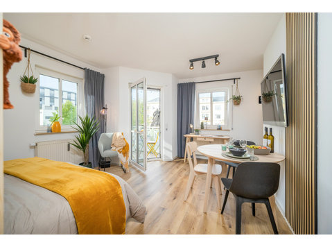 Elegant Studio Apartment with Balcony - For Rent