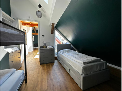 High-quality 3-bedroom maisonette apartment with spacious… - À louer