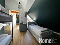 High-quality 3-bedroom duplex apartment with a balcony - Апартаменти