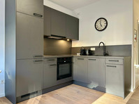 Fully Furnished 2-Bedroom Apartment with Terrace – Near… - Aluguel