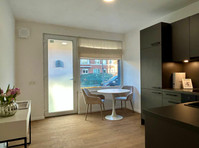 Fully Furnished 2-Bedroom Apartment with Terrace – Near… - Aluguel