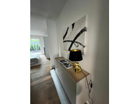 Fully Furnished 2-Bedroom Apartment with Terrace – Near… - Aluguel