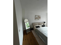 Fully Furnished 2-Bedroom Apartment with Terrace – Near… - Aluguel